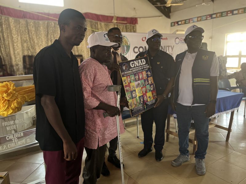 A presentation being made at the launch, with a Ghana National Association of the Deaf chart held up